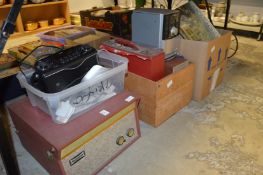 An old Dansette portable record player and other items.