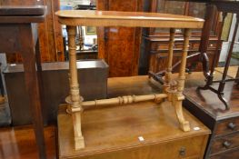 A mahogany stretcher table.