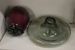 An unusual moulded glass model of an aubergine together with a misshapen vase.
