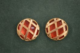 A pair of decorative ear clips.