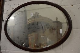 An oval mirror.