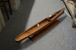 A cut-out model of a boat.