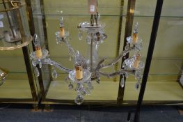 A Venetian style glass six branch chandelier.