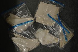 A quantity of embroidered and other napkins.