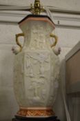 A large Chinese urn shaped lamp base.
