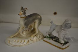 A Staffordshire model of a greyhound and a poodle.