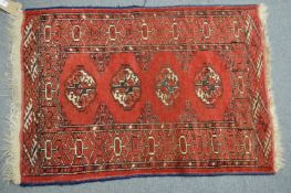A small Bokhara rug.