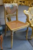 A 19th century painted occasional chair.