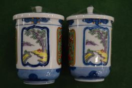 A pair of Chinese porcelain jars and covers.