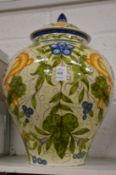 A good large Cantagalli vase and cover painted with birds amongst foliage.