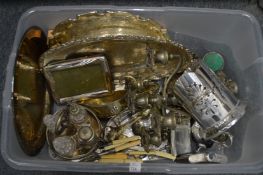 A box of plated wares.