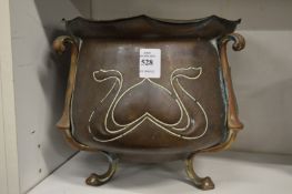 An Art Nouveau copper jardiniere.