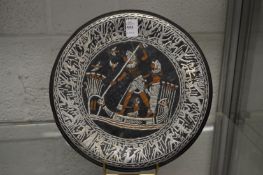 An Egyptian revival overlaid copper charger.