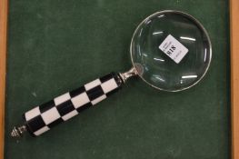 A magnifying glass.