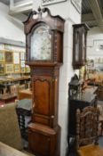 A good 19th century oak and mahogany longcase clock with painted arched dial, eight day movement