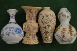 Four Chinese porcelain snuff bottles.