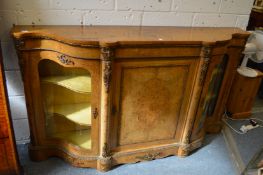 A Victorian walnut credenza with ormolu mounts.