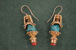 A pair of gilt metal and turquoise chandelier style earrings.