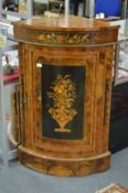 A good pair of Victorian style marquetry inlaid walnut bow fronted corner cupboards.