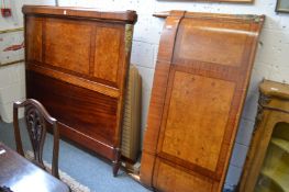 A French inlaid mahogany bed frame with base.