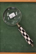 A magnifying glass.