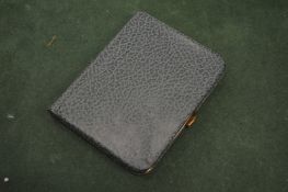 A cigarette case.