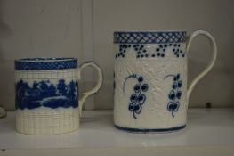 Two 19th century blue and white tankards.