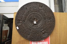 An eastern carved hardwood circular table top.