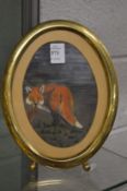 A small oval picture of a fox.