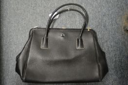 A ladies' black leather handbag.