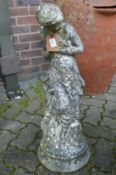 A composite garden ornament modelled as a classical young lady.
