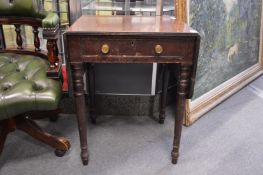 A 19th century mahogany drop flap occasional table.