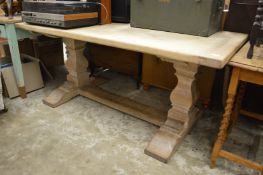 A large oak refectory style table.