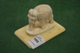 A carved model of an elephant.