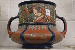 A good Mettlach Art Nouveau pottery jardiniere decorated with young maidens.