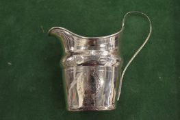 A Georgian silver cream jug.
