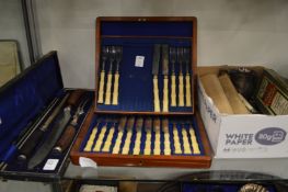 A cased carving set and other items.