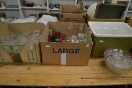 A large quantity of household and colourful glassware.