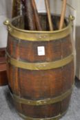 A brass bound oak bucket.