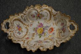 A Dresden floral decorated twin handled dish.