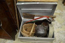 A tin trunk containing a quantity of bygones to include a large meat cleaver, wicker basket etc.