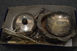 A small box of plated wares.