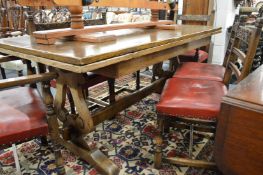An oak draw leaf refectory dining table.