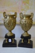A good pair of ormolu classical urns on marble bases.