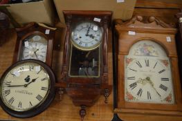 Four various modern wall clocks.