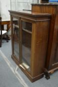 A mahogany two door bookcase.