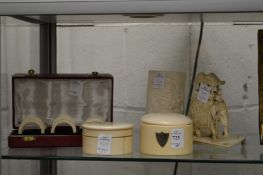 A late 19th century carved ivory elephant group and other items similar.