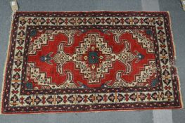 A small Persian rug.
