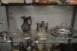 A silver collared cut glass decanter, plated items to include a biscuit box and cover, entree dish