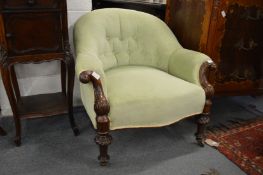 A good Victorian mahogany framed button upholstered armchair.